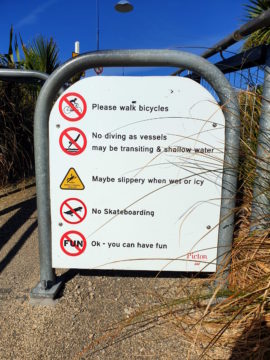 List of prohibitions and warning, followed by the crossed-out word "Fun" and the explanatory text: "Ok – you can have fun"